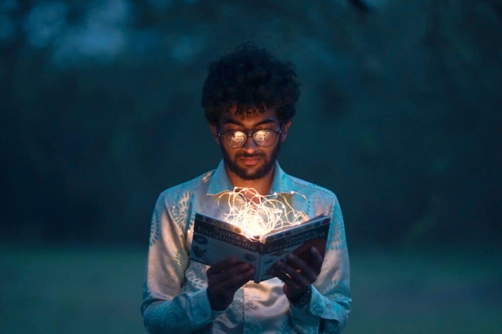 a man holding a book